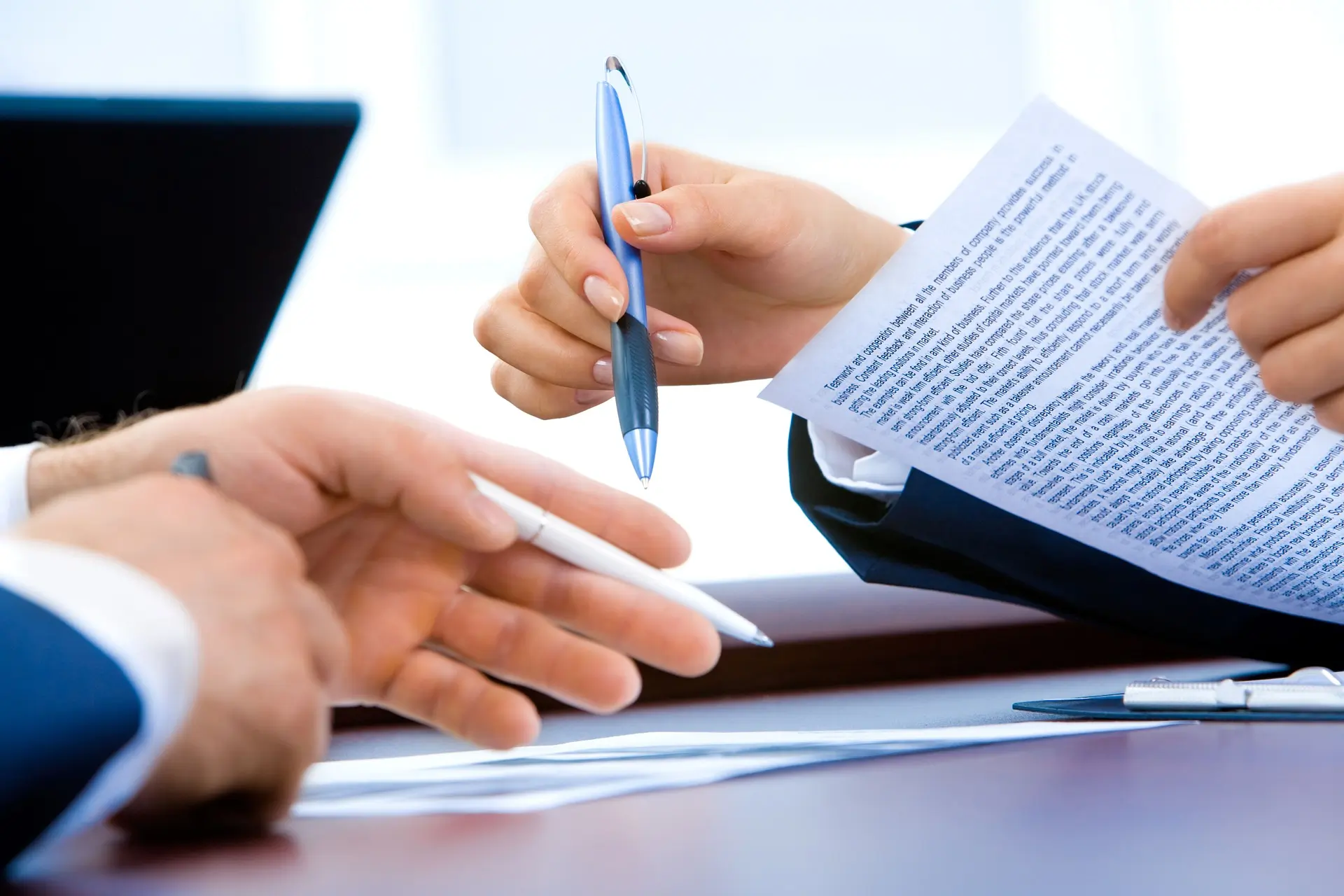 Business Consulting Services Guide 2025: Assessments, Roadmaps, Operating Model, Pricing, KPIs and ROI Two people having a business meeting