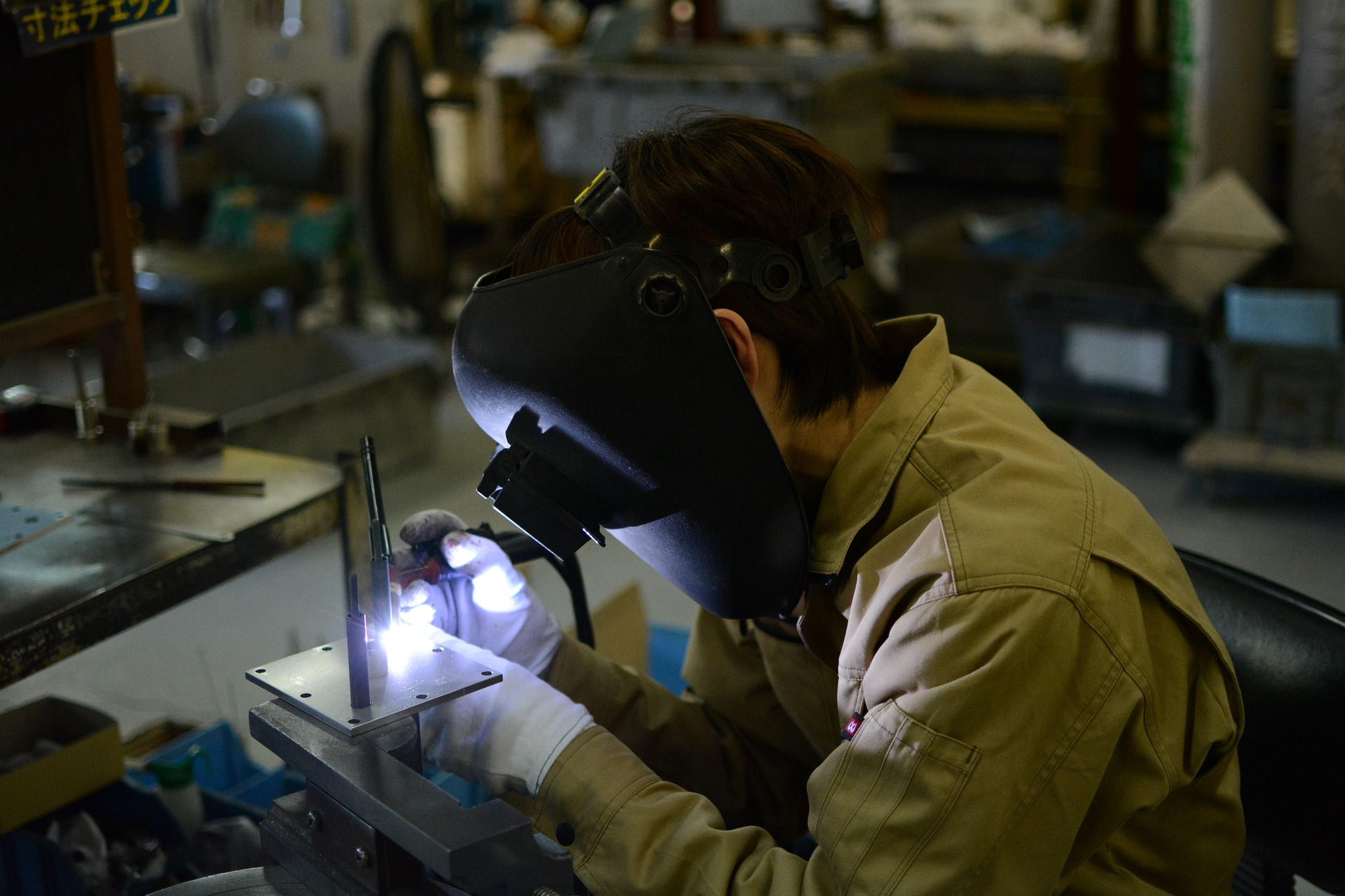 OEM Supply Chain Consulting Guide: 2025 Resilience, Cost, Quality, Delivery and ESG Man welding in a factory