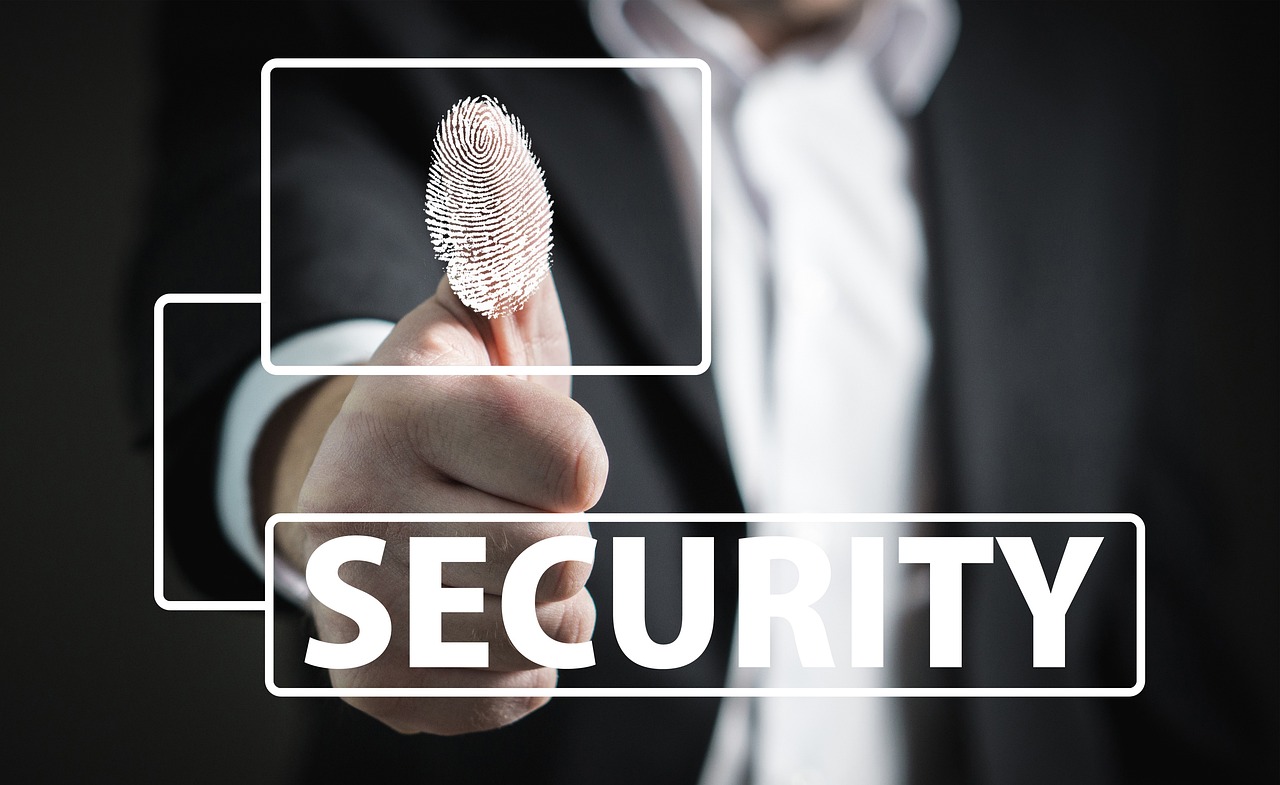Data Privacy Consulting for Operational Compliance and AI Data Governance Image of man putting his thumb print