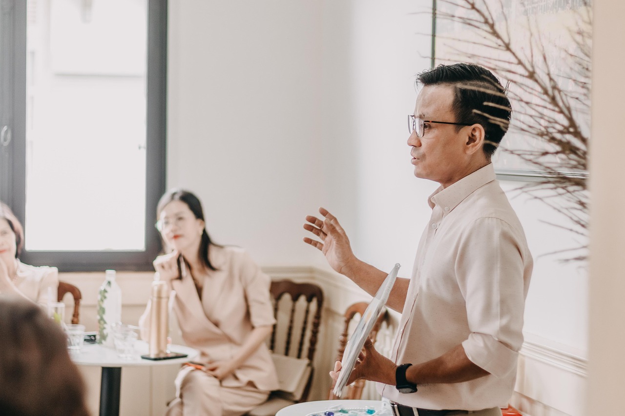 Merger & Acquisition Consultants: Expert Teams, Proven Methods Business people in meeting room talking