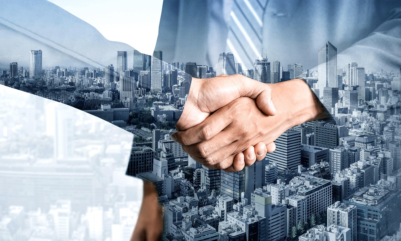 Mergers & Acquisitions Services Across the Full Deal Lifecycle Business handshake