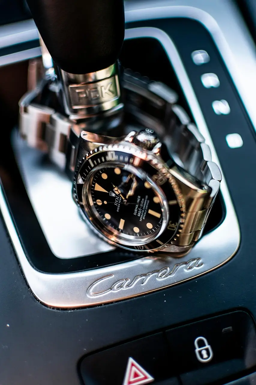Image of watch and Porsche Carrera brand name
