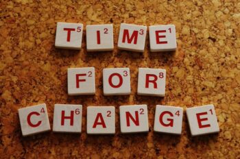 Letter blocks spelling out 'time for change'