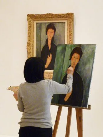 Image of a woman painting