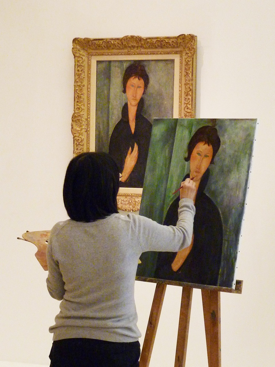 Image of a woman painting