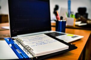 Image of a notebook and a laptop