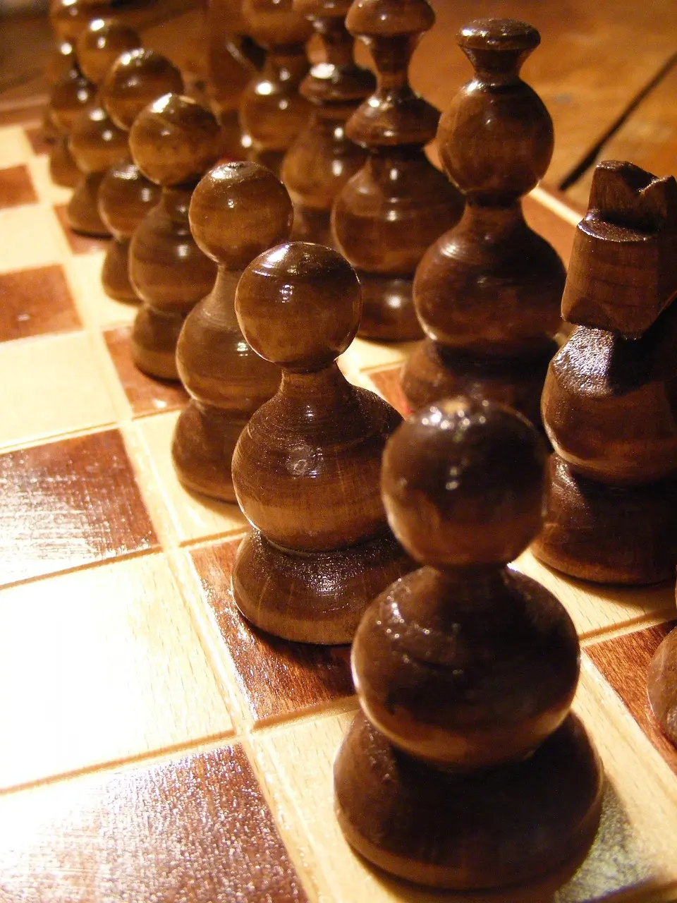 Image of chess pieces on a board