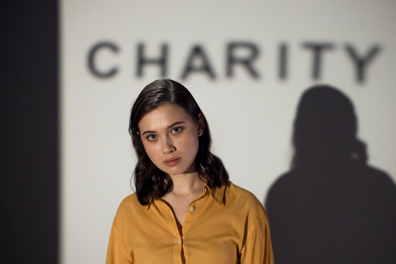 Woman in yellow button-up shirt
