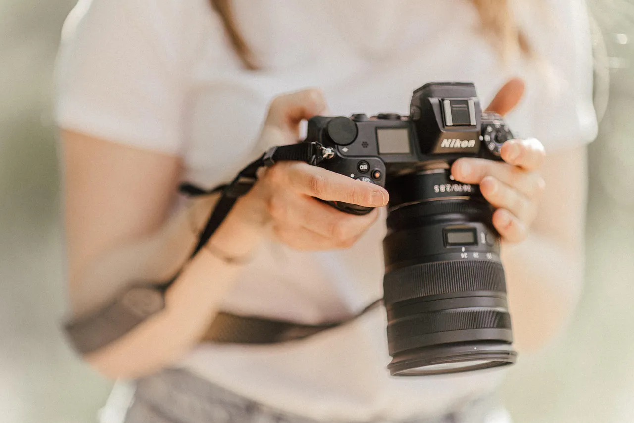 Woman holding a camera